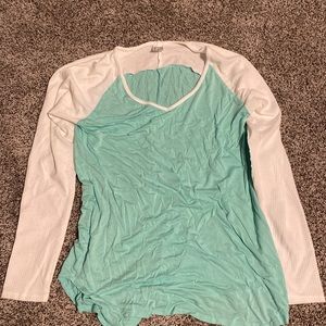White and teal v neck sweater